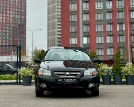 Чорний Кіа Черато, об'ємом двигуна 2 л та пробігом 270 тис. км за 4000 $, фото 1 на Automoto.ua