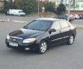 Чорний Кіа Черато, об'ємом двигуна 1.6 л та пробігом 248 тис. км за 3700 $, фото 1 на Automoto.ua