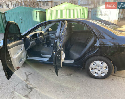 Черный Киа Черато, объемом двигателя 1.59 л и пробегом 158 тыс. км за 4500 $, фото 8 на Automoto.ua