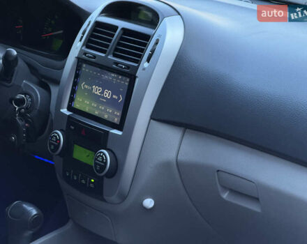 Черный Киа Черато, объемом двигателя 1.98 л и пробегом 180 тыс. км за 5750 $, фото 26 на Automoto.ua