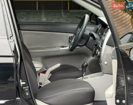 Черный Киа Черато, объемом двигателя 1.98 л и пробегом 180 тыс. км за 5500 $, фото 20 на Automoto.ua