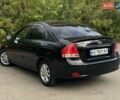 Черный Киа Черато, объемом двигателя 2 л и пробегом 173 тыс. км за 4800 $, фото 5 на Automoto.ua