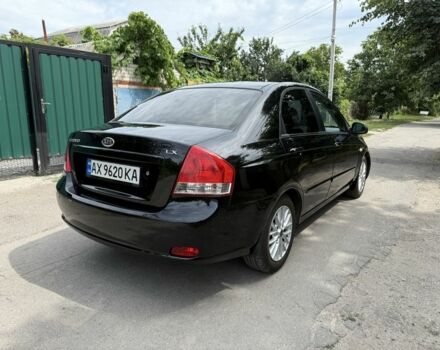 Чорний Кіа Черато, об'ємом двигуна 1.6 л та пробігом 180 тис. км за 4300 $, фото 5 на Automoto.ua