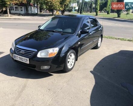 Чорний Кіа Черато, об'ємом двигуна 1.6 л та пробігом 260 тис. км за 4700 $, фото 1 на Automoto.ua