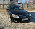 Черный Киа Черато, объемом двигателя 1.6 л и пробегом 195 тыс. км за 5000 $, фото 1 на Automoto.ua