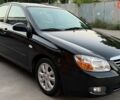 Чорний Кіа Черато, об'ємом двигуна 1.6 л та пробігом 110 тис. км за 5600 $, фото 1 на Automoto.ua