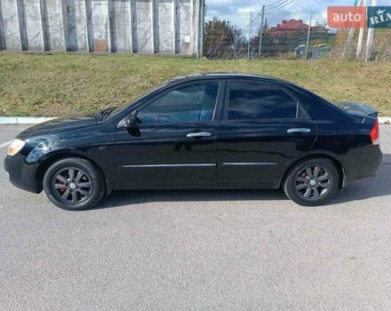 Черный Киа Черато, объемом двигателя 2 л и пробегом 298 тыс. км за 4250 $, фото 4 на Automoto.ua