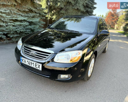 Черный Киа Черато, объемом двигателя 2 л и пробегом 110 тыс. км за 6300 $, фото 32 на Automoto.ua