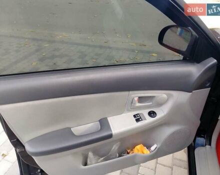 Чорний Кіа Черато, об'ємом двигуна 1.6 л та пробігом 335 тис. км за 5500 $, фото 9 на Automoto.ua