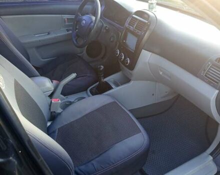 Чорний Кіа Черато, об'ємом двигуна 1.6 л та пробігом 232 тис. км за 4250 $, фото 12 на Automoto.ua