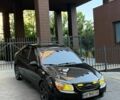 Чорний Кіа Черато, об'ємом двигуна 1.58 л та пробігом 239 тис. км за 5200 $, фото 1 на Automoto.ua