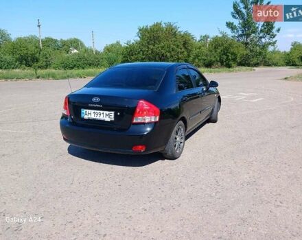 Черный Киа Черато, объемом двигателя 1.6 л и пробегом 225 тыс. км за 5200 $, фото 3 на Automoto.ua