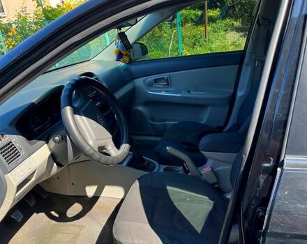 Черный Киа Черато, объемом двигателя 1.6 л и пробегом 300 тыс. км за 3000 $, фото 2 на Automoto.ua