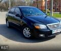 Черный Киа Черато, объемом двигателя 1.6 л и пробегом 184 тыс. км за 5300 $, фото 1 на Automoto.ua