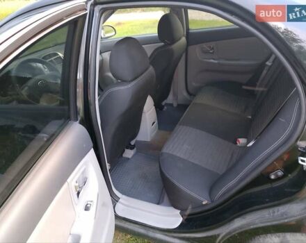 Черный Киа Черато, объемом двигателя 1.59 л и пробегом 237 тыс. км за 3900 $, фото 12 на Automoto.ua