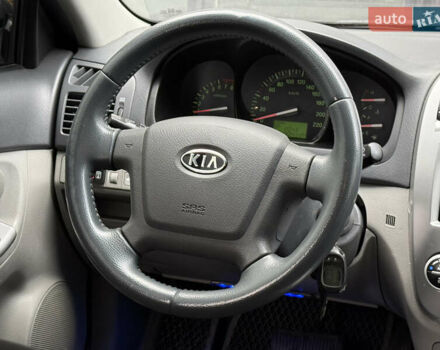 Черный Киа Черато, объемом двигателя 1.98 л и пробегом 180 тыс. км за 5500 $, фото 38 на Automoto.ua