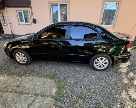 Чорний Кіа Черато, об'ємом двигуна 1.6 л та пробігом 16 тис. км за 8000 $, фото 1 на Automoto.ua
