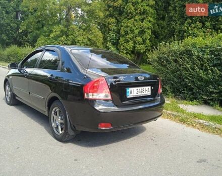 Чорний Кіа Черато, об'ємом двигуна 1.6 л та пробігом 200 тис. км за 4500 $, фото 10 на Automoto.ua