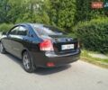 Чорний Кіа Черато, об'ємом двигуна 1.6 л та пробігом 200 тис. км за 4500 $, фото 10 на Automoto.ua