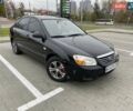 Черный Киа Черато, объемом двигателя 1.6 л и пробегом 200 тыс. км за 4000 $, фото 1 на Automoto.ua