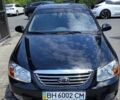 Чорний Кіа Черато, об'ємом двигуна 1.59 л та пробігом 70 тис. км за 5500 $, фото 1 на Automoto.ua