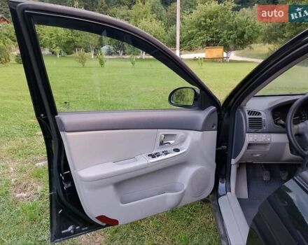 Черный Киа Черато, объемом двигателя 1.59 л и пробегом 237 тыс. км за 3900 $, фото 16 на Automoto.ua