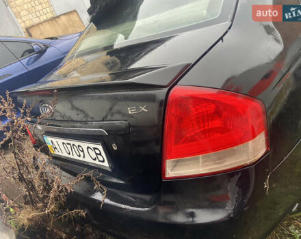 Черный Киа Черато, объемом двигателя 1.98 л и пробегом 95 тыс. км за 1650 $, фото 1 на Automoto.ua