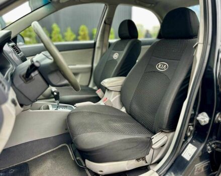 Чорний Кіа Черато, об'ємом двигуна 2 л та пробігом 270 тис. км за 4000 $, фото 10 на Automoto.ua