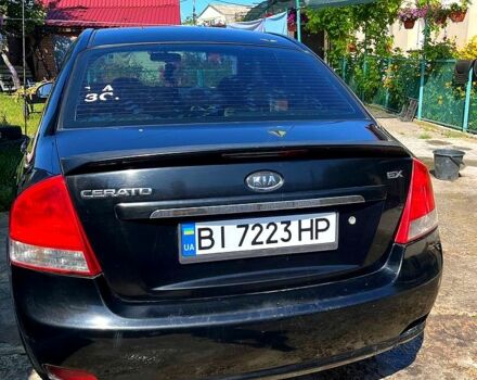 Черный Киа Черато, объемом двигателя 1.6 л и пробегом 300 тыс. км за 3000 $, фото 1 на Automoto.ua