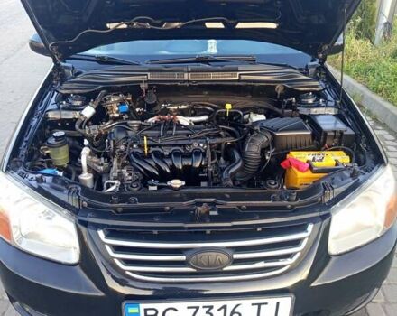 Чорний Кіа Черато, об'ємом двигуна 1.6 л та пробігом 232 тис. км за 4250 $, фото 29 на Automoto.ua