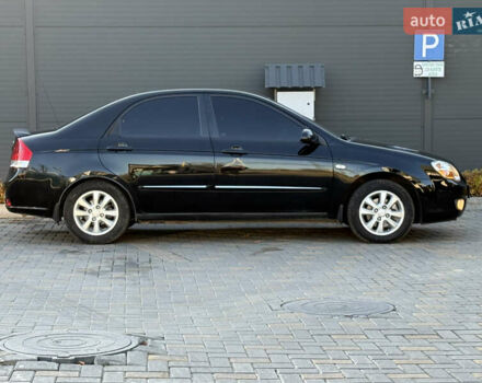 Черный Киа Черато, объемом двигателя 1.98 л и пробегом 180 тыс. км за 5750 $, фото 18 на Automoto.ua