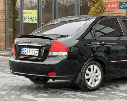 Черный Киа Черато, объемом двигателя 1.98 л и пробегом 180 тыс. км за 5500 $, фото 16 на Automoto.ua