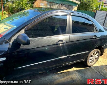 Черный Киа Черато, объемом двигателя 1.6 л и пробегом 300 тыс. км за 3000 $, фото 5 на Automoto.ua