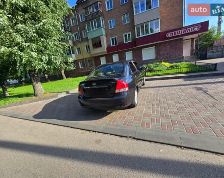 Черный Киа Черато, объемом двигателя 1.6 л и пробегом 232 тыс. км за 4000 $, фото 2 на Automoto.ua