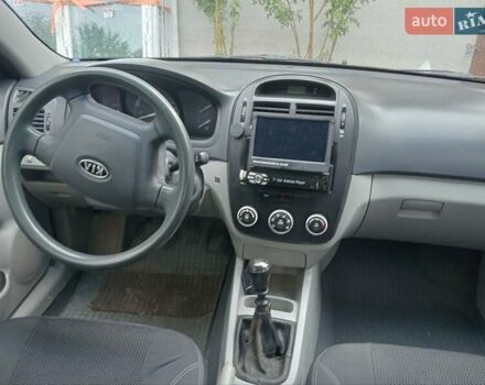 Черный Киа Черато, объемом двигателя 1.6 л и пробегом 260 тыс. км за 3800 $, фото 3 на Automoto.ua