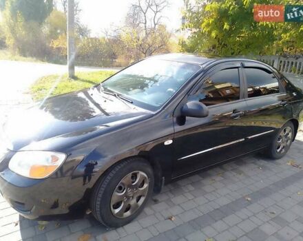 Чорний Кіа Черато, об'ємом двигуна 1.6 л та пробігом 335 тис. км за 5500 $, фото 10 на Automoto.ua
