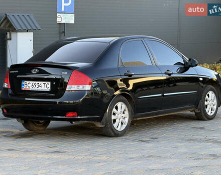 Черный Киа Черато, объемом двигателя 1.98 л и пробегом 180 тыс. км за 5750 $, фото 14 на Automoto.ua