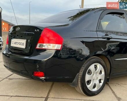Чорний Кіа Черато, об'ємом двигуна 1.59 л та пробігом 75 тис. км за 6690 $, фото 7 на Automoto.ua