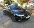 Черный Киа Черато, объемом двигателя 1.59 л и пробегом 180 тыс. км за 7499 $, фото 1 на Automoto.ua