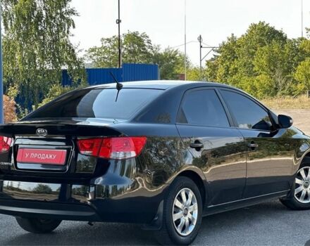 Чорний Кіа Черато, об'ємом двигуна 2 л та пробігом 170 тис. км за 5700 $, фото 1 на Automoto.ua