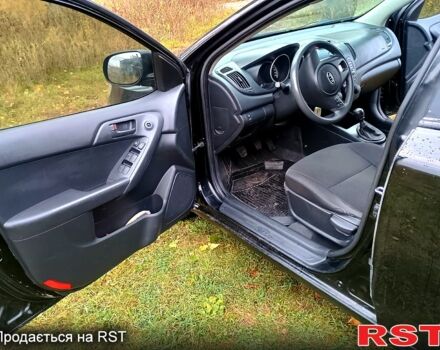Черный Киа Черато, объемом двигателя 1.6 л и пробегом 123 тыс. км за 4900 $, фото 1 на Automoto.ua