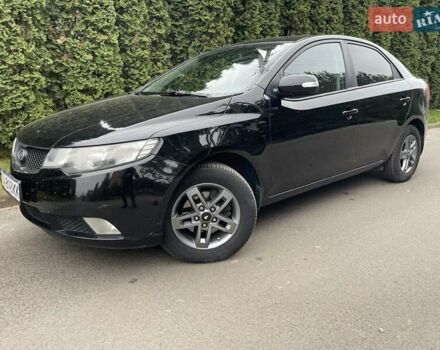 Чорний Кіа Черато, об'ємом двигуна 1.59 л та пробігом 203 тис. км за 6100 $, фото 1 на Automoto.ua