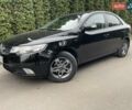 Чорний Кіа Черато, об'ємом двигуна 1.59 л та пробігом 203 тис. км за 6100 $, фото 1 на Automoto.ua