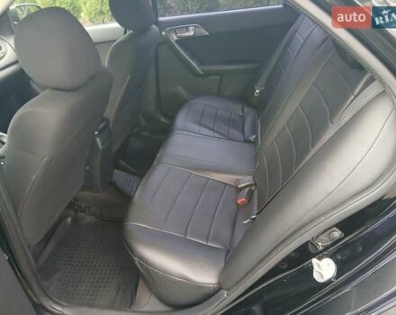 Черный Киа Черато, объемом двигателя 1.6 л и пробегом 253 тыс. км за 5300 $, фото 15 на Automoto.ua