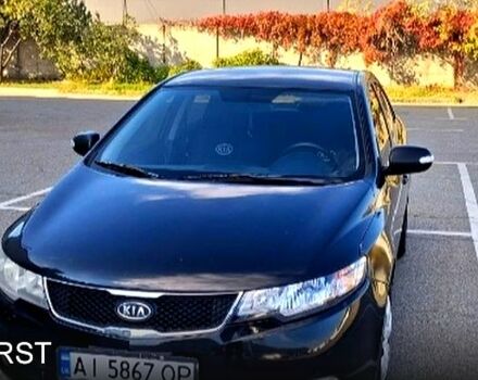 Черный Киа Черато, объемом двигателя 1.6 л и пробегом 300 тыс. км за 4999 $, фото 1 на Automoto.ua