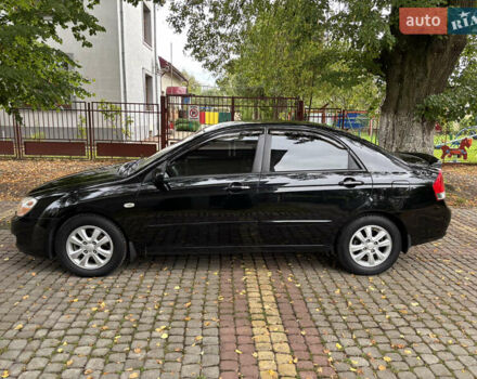 Черный Киа Черато, объемом двигателя 1.98 л и пробегом 265 тыс. км за 5450 $, фото 2 на Automoto.ua