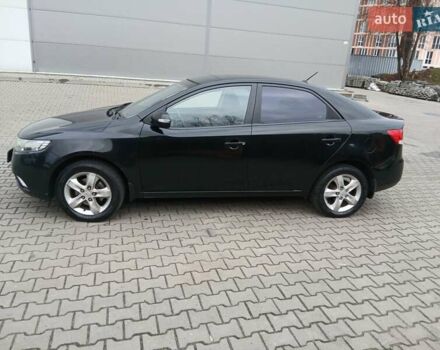 Черный Киа Черато, объемом двигателя 1.59 л и пробегом 253 тыс. км за 5300 $, фото 8 на Automoto.ua