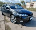 Черный Киа Черато, объемом двигателя 1.6 л и пробегом 182 тыс. км за 5199 $, фото 1 на Automoto.ua