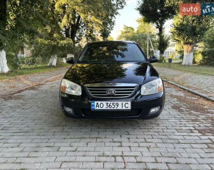 Чорний Кіа Черато, об'ємом двигуна 1.98 л та пробігом 265 тис. км за 5900 $, фото 3 на Automoto.ua