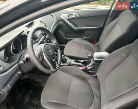 Черный Киа Черато, объемом двигателя 1.6 л и пробегом 253 тыс. км за 5300 $, фото 13 на Automoto.ua